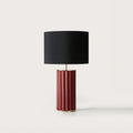 Fluted round ceramic column table lamp, in deep red with a black drum shade