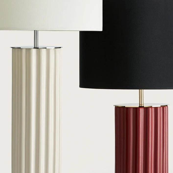 Fluted round ceramic column table lamp, close-up of the cream and red bodies