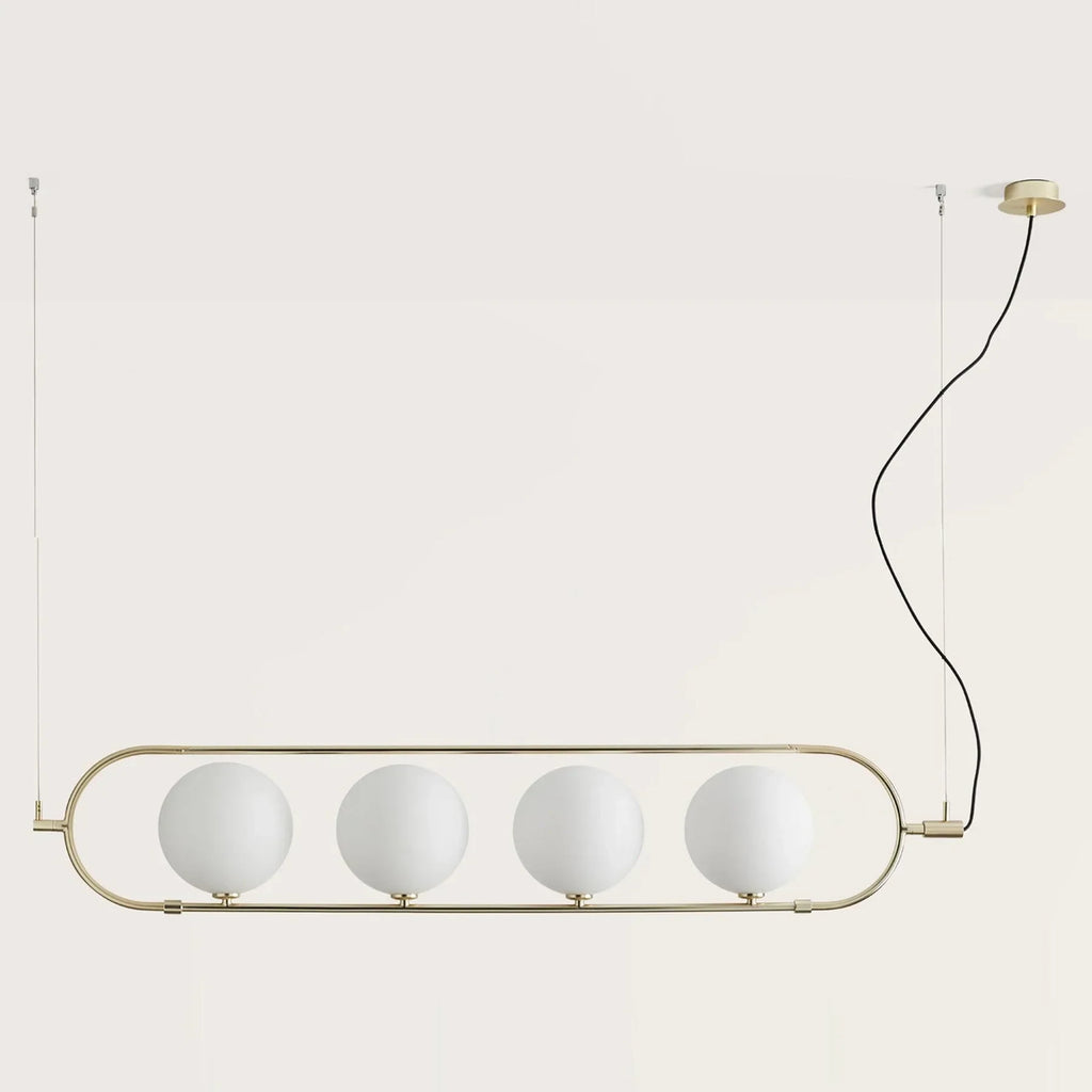 Four globe linear pendant, in matte brass