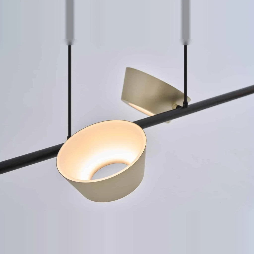 Four-head hollow cone linear LED pendant, close-up of a shade