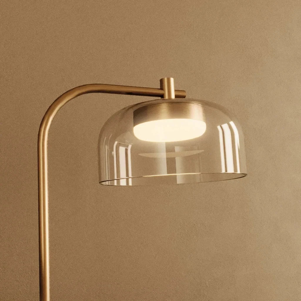 Arc table lamp with glass dome shade, close-up of the glass dome and arm