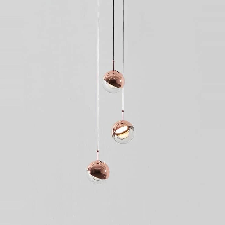 Glass globe cluster pendant, three lights, in copper