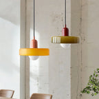 Glass pendant light with ring shade, yellow and army green pair