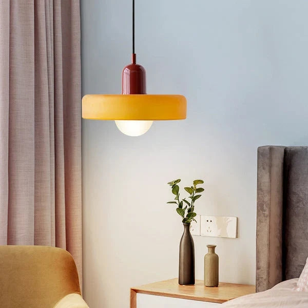 Glass pendant light with ring shade, yellow, in a sunny room