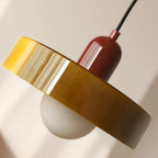 Glass pendant light with ring shade, close-up of the army green ring shade