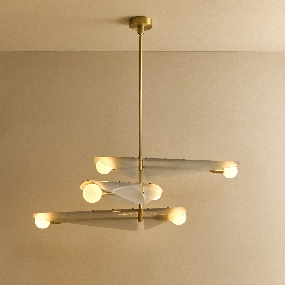 Glass wing chandelier, lit, three tiers