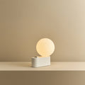 Globe table lamp or wall light, chalk, single lamp on a shelf