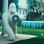 Gorilla floor lamp with an adjustable arm
