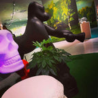 Gorilla floor lamp with an adjustable arm