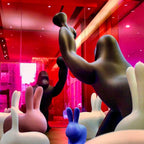 Gorilla floor lamp with an adjustable arm