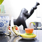 Gorilla floor lamp with an adjustable arm