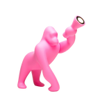 Gorilla floor lamp with an adjustable arm, in pink
