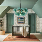 Green glass bubble chandelier, in a nursery