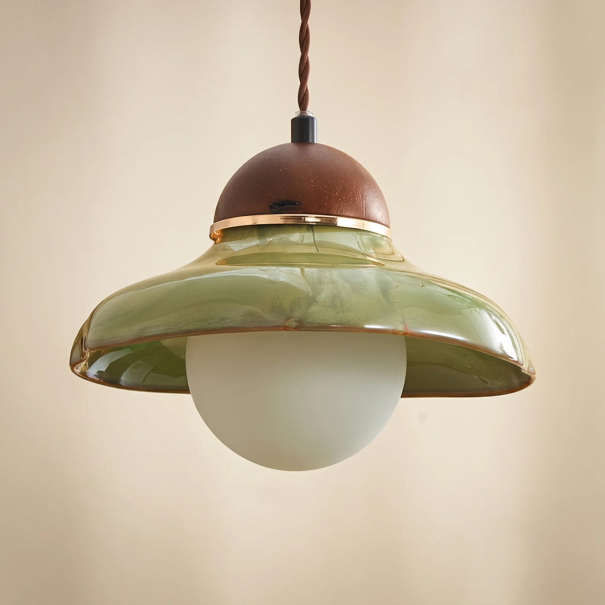 Green glass pendant light with walnut cap