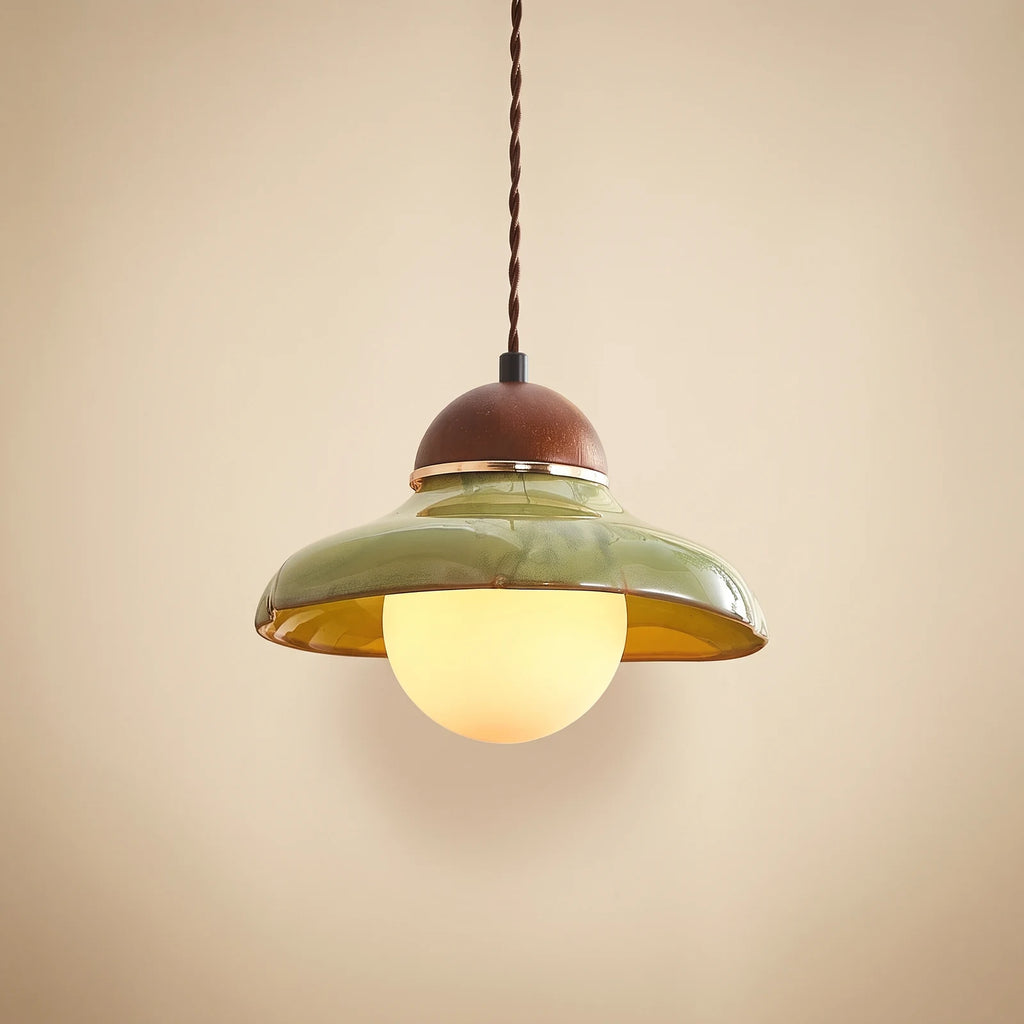 Green glass pendant light with walnut cap