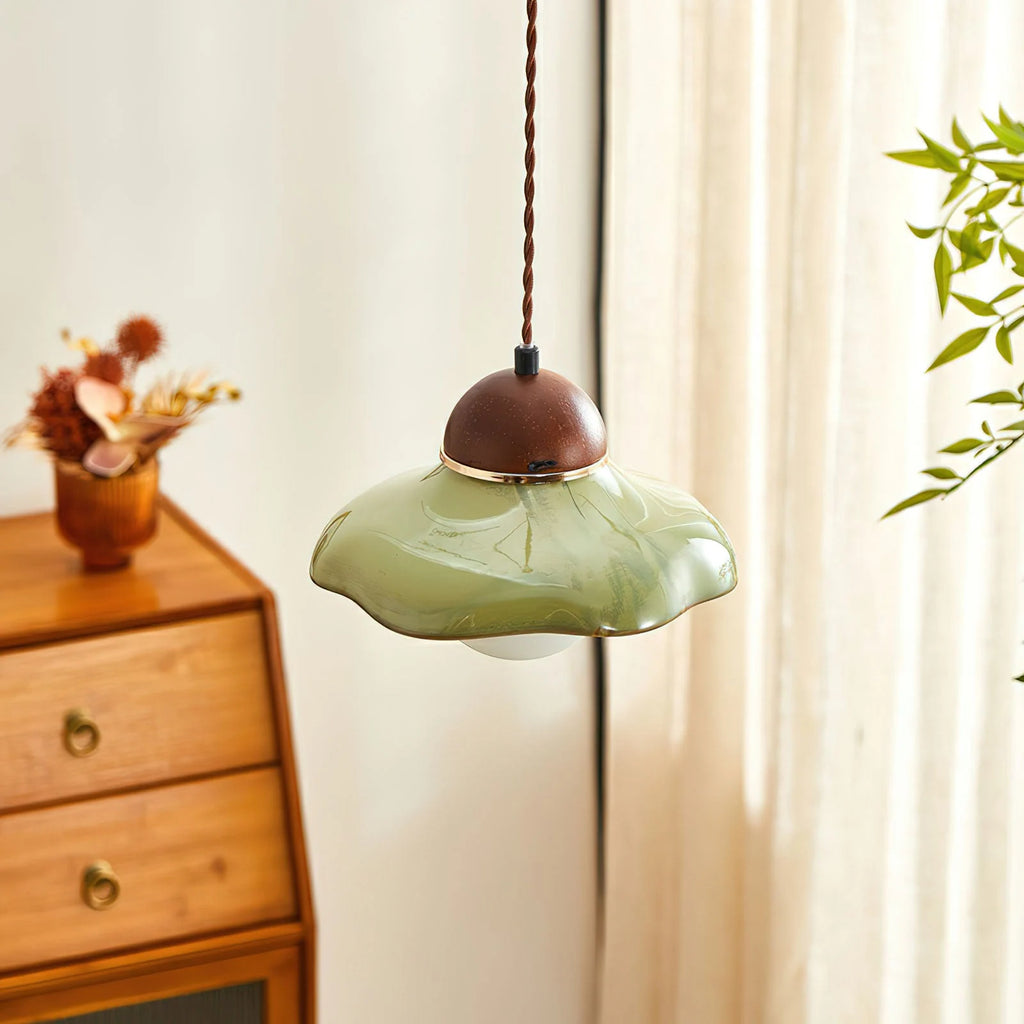 Green glass pendant light with walnut cap