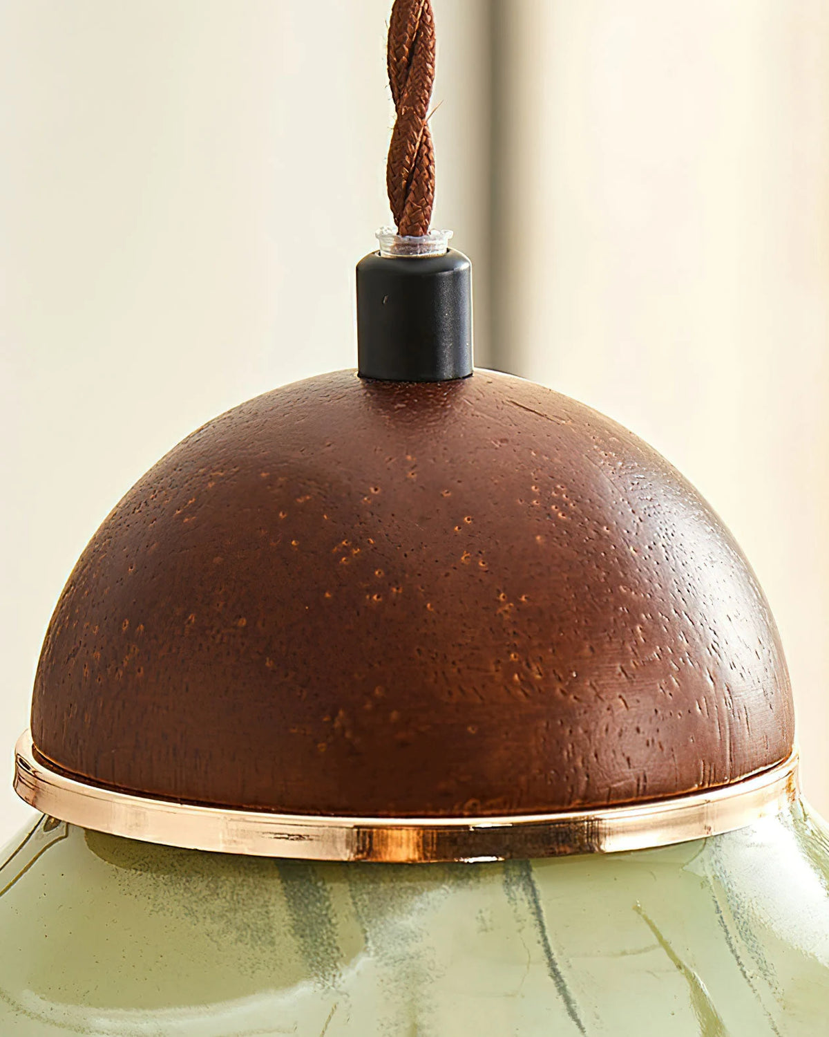 Green glass pendant light with walnut cap