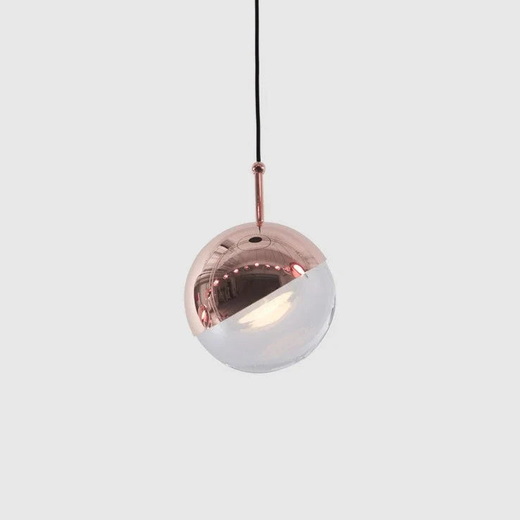 Half-capped glass globe LED pendant, in copper on a pale background