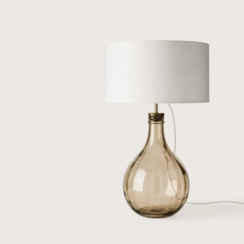 Hand-blown brown glass teardrop table lamp with walnut collar, with a white drum shade (sold separately), side view