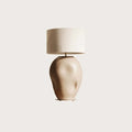 Hand-painted ceramic table lamp with rounded dimpled body, shown with a drum shade (sold separately)