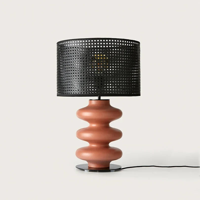 Hand-painted wavy ceramic table lamp, in terracotta with a black perforated shade