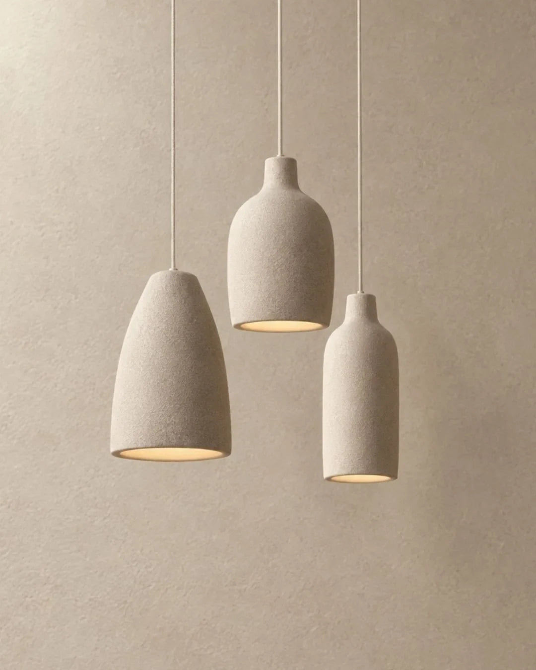 Knitted-texture pendant light, trio of three shapes