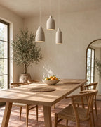 Knitted-texture pendant light, trio above a dining table
