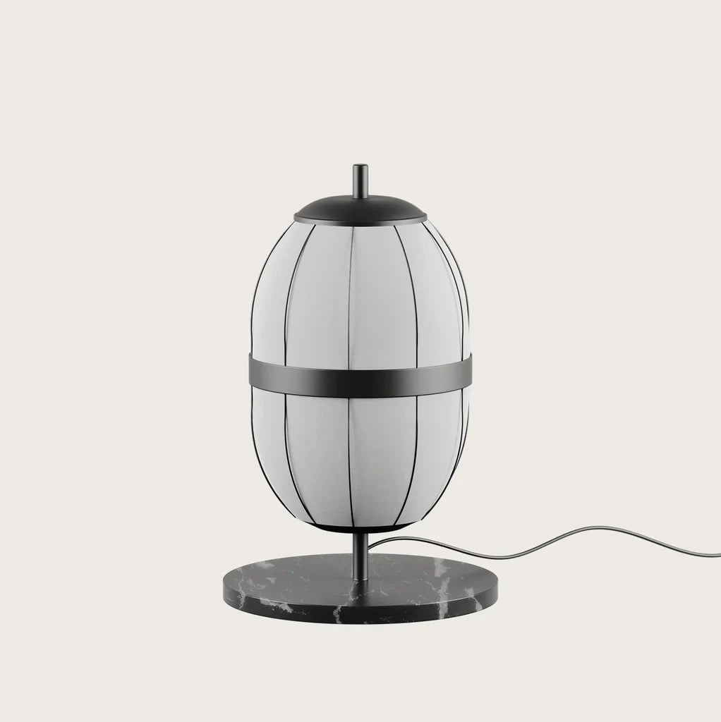 Lantern-style linen shade table lamp, black marble base, close-up of the shade and marble base
