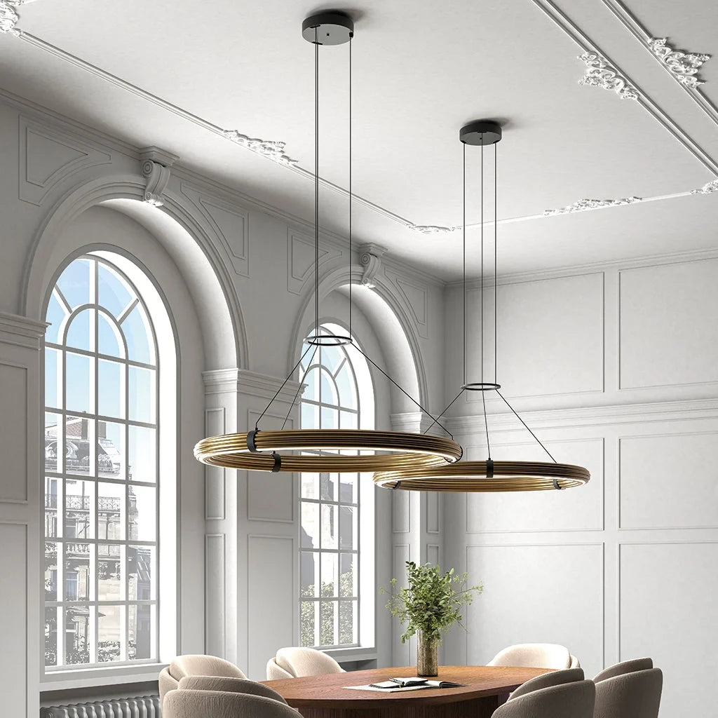 Large LED ring pendant, two above a long dining table