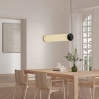 Large linen tube pendant, horizontally above a dining table