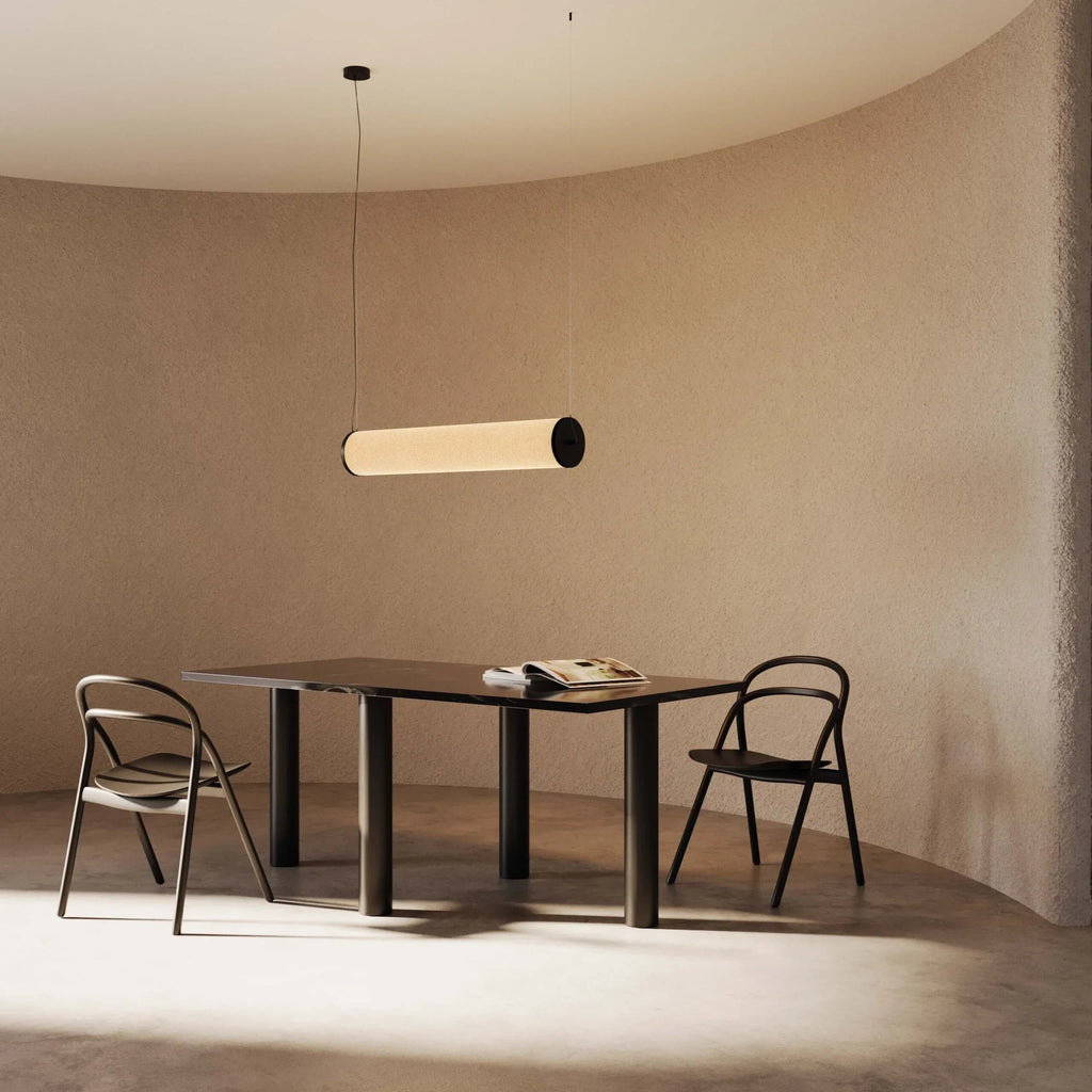 Large linen tube pendant, above a dining table in a curved room