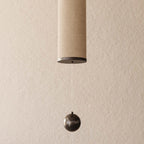 Large linen tube pendant, close-up of the sphere below the shade