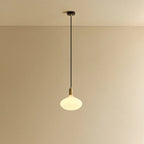 Large opal oval bulb pendant, lit against a plain wall
