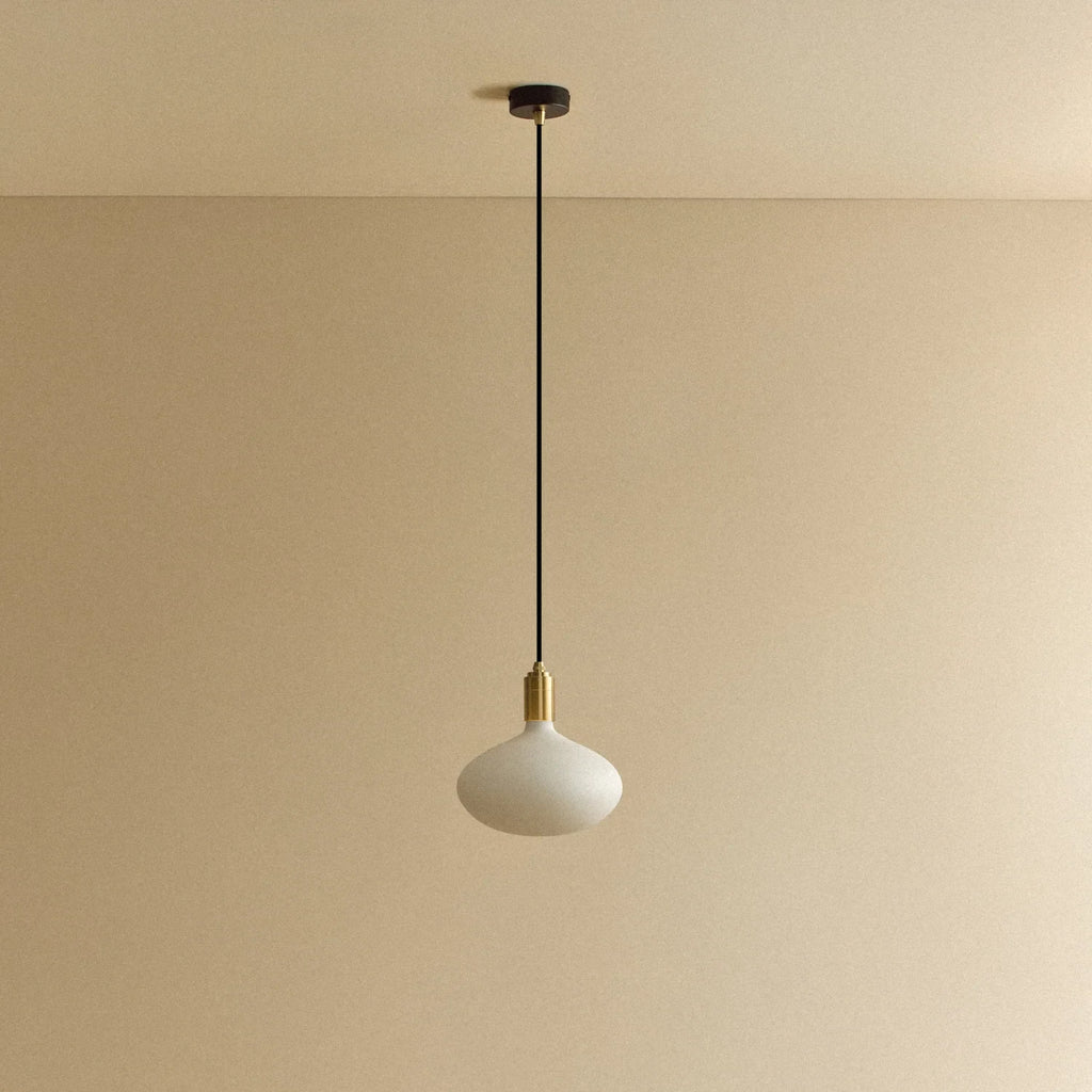 Large opal oval bulb pendant, unlit against a plain wall