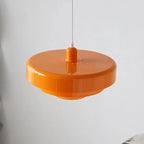 Layered metal pendant light, in orange, from below