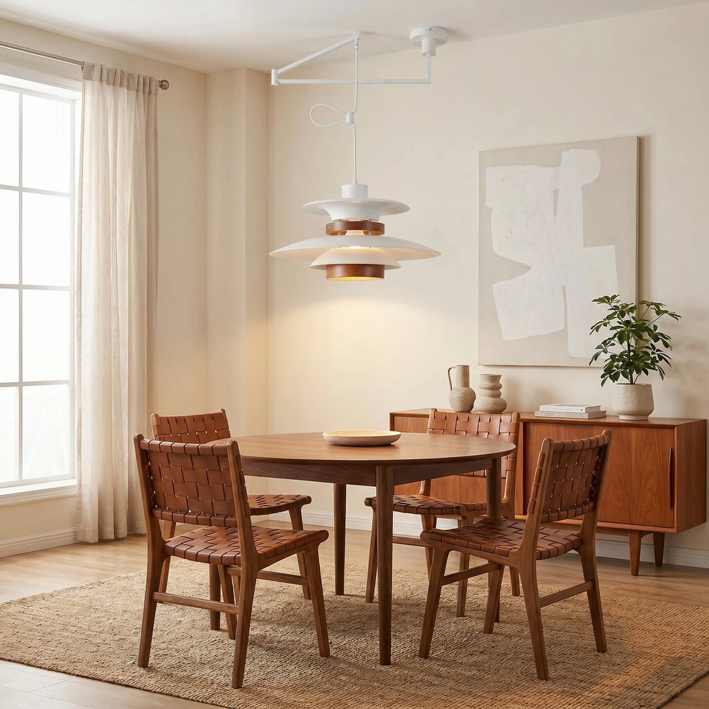 White swing arm pendant light in a dining room