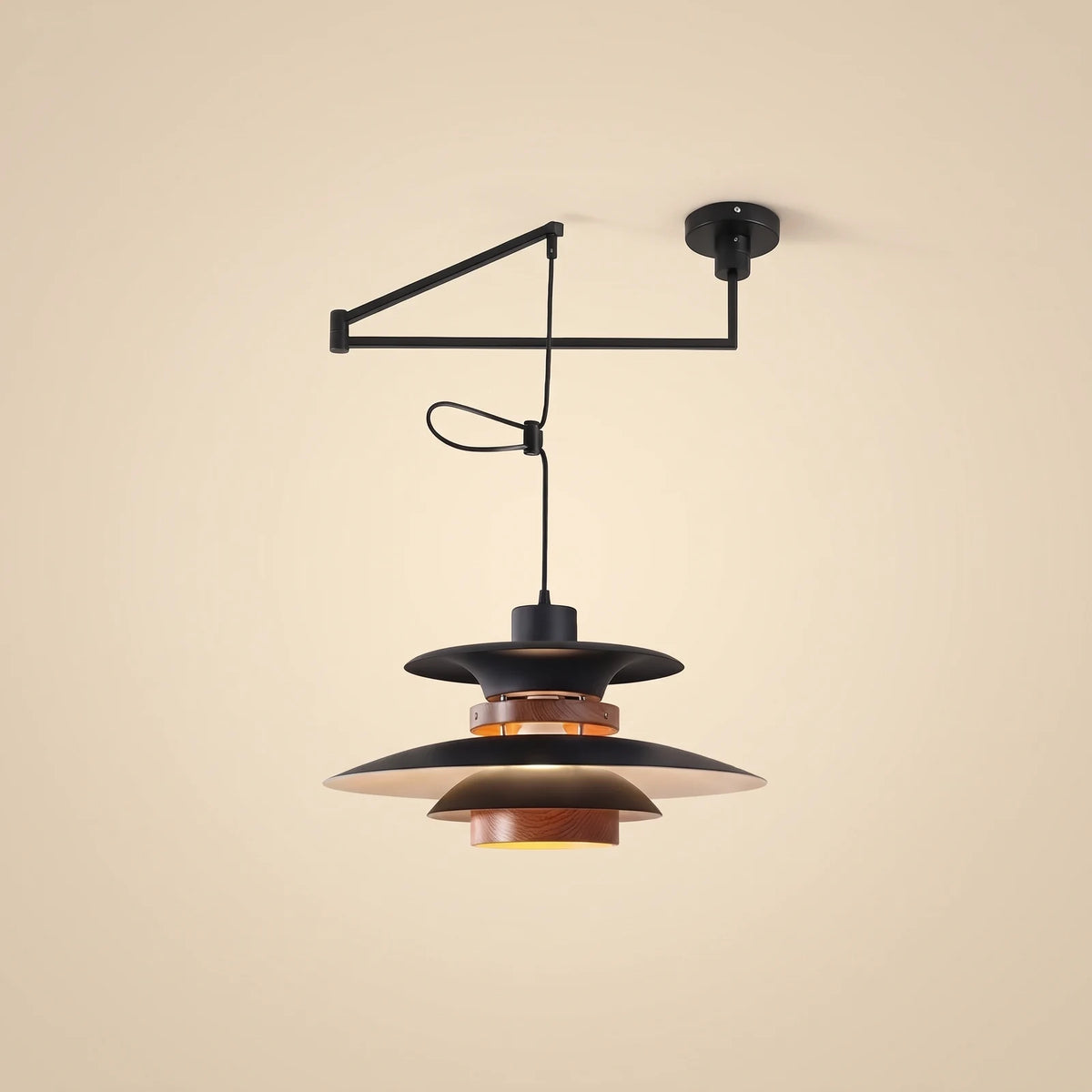 Layered pendant light with black swing arm