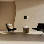 Leather drum pendant, above a lounge seating area