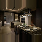 Library-style metal pendant, row in chrome above a dining table