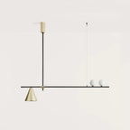 Linear bar pendant with brass cone and glass spheres, on a plain background