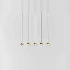 Linear glass globe pendant, five lights, in brass, in a row, low