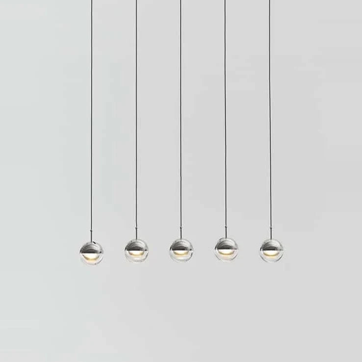 Linear glass globe pendant, five lights, in chrome, in a row
