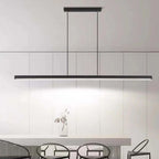 Linear LED pendant light, above a white kitchen