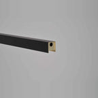 Linear LED pendant with touchless dimmer, close-up of the black end with sensor