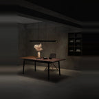 Linear LED pendant with touchless dimmer, lit above a dining table