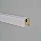 Linear LED pendant with touchless dimmer, close-up of the white end with sensor