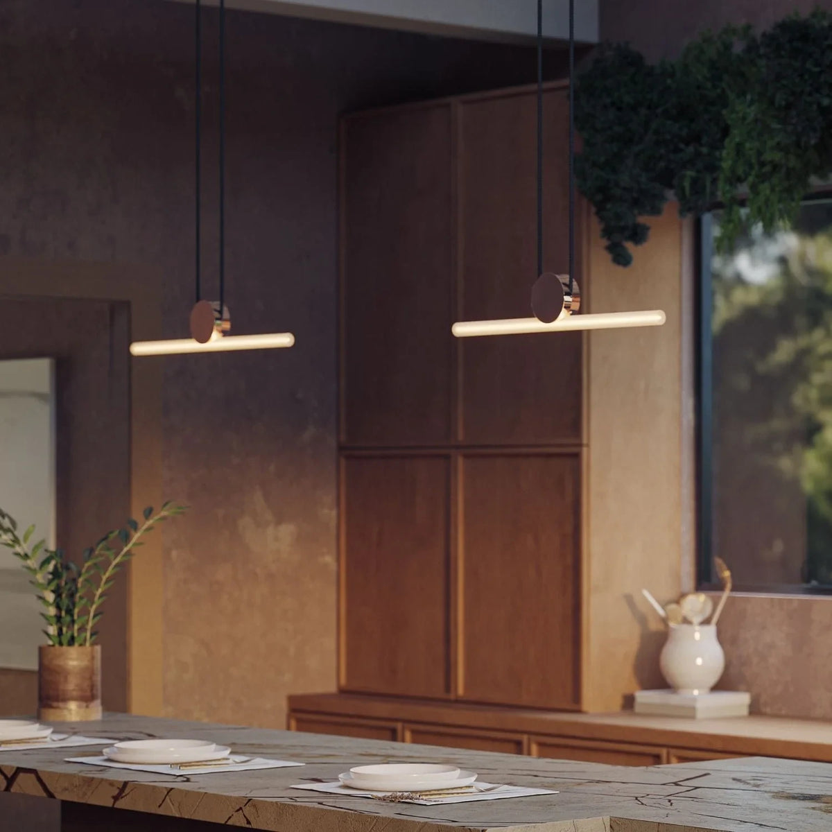 Linear LED tube pendant, set of 2, polished brass, over a kitchen island