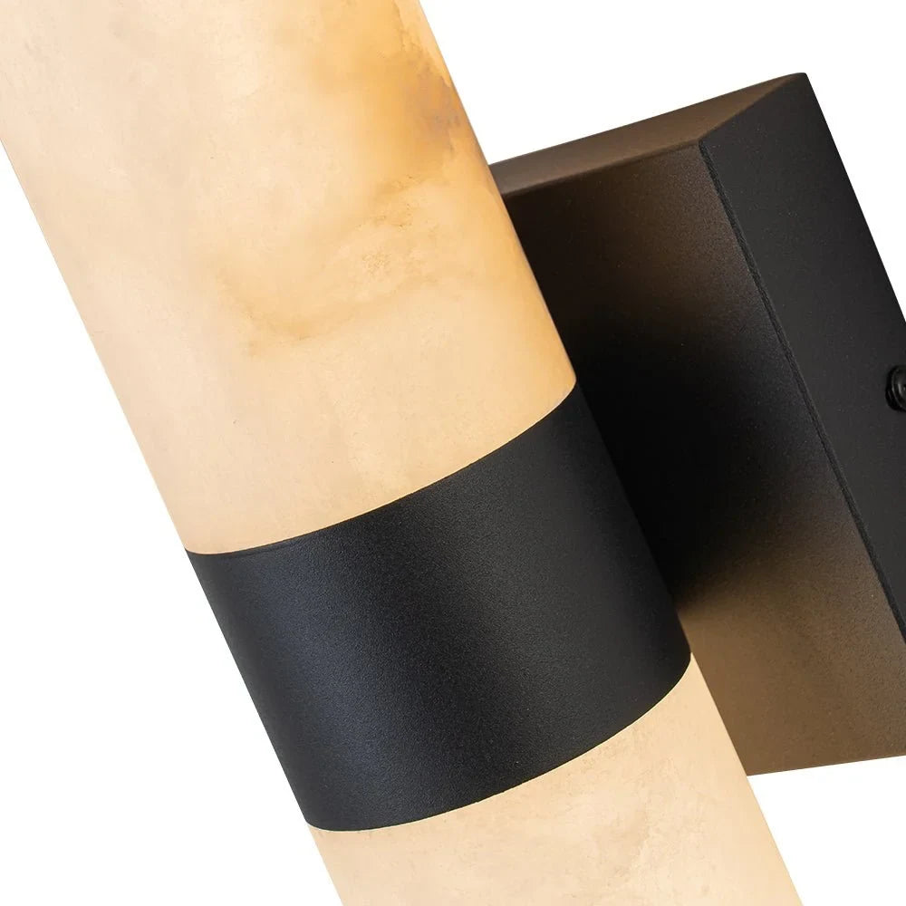 Linear LED wall light with a veined shade, black bracket detail