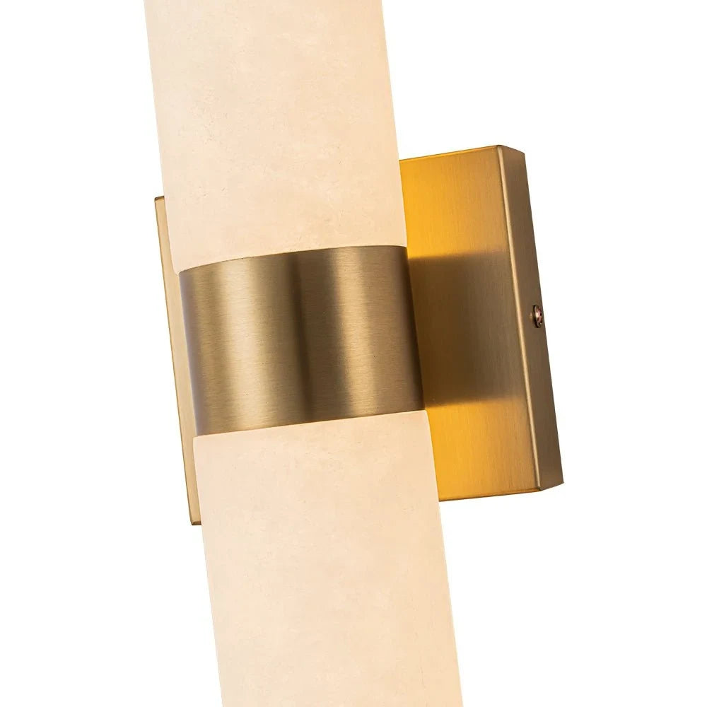 Linear LED wall light with a veined shade, brass bracket close-up