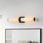 Linear LED wall light with a veined shade, horizontal, above a mirror